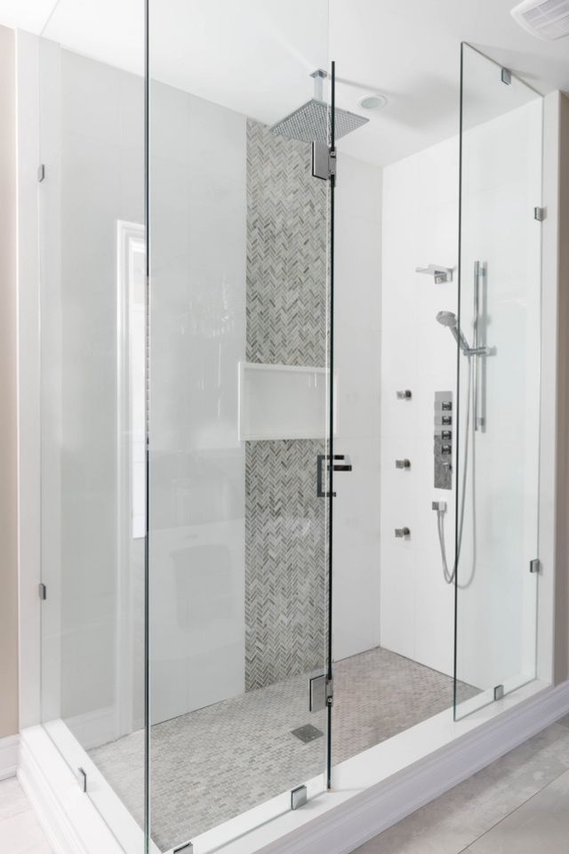 Dvira Ovadia bathroom design with gray and white walk in shower 