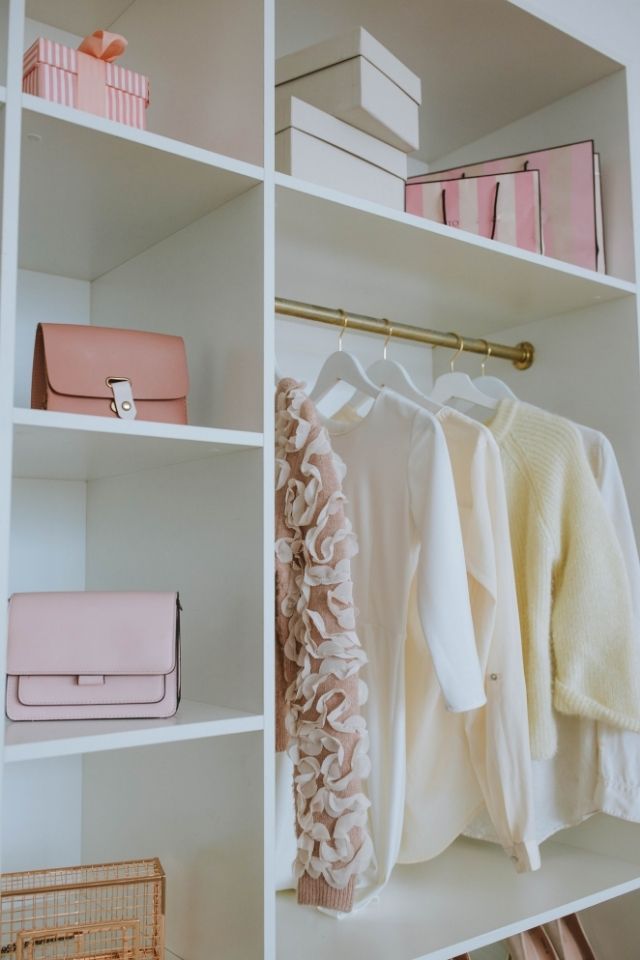Organization in closet with women's clothes