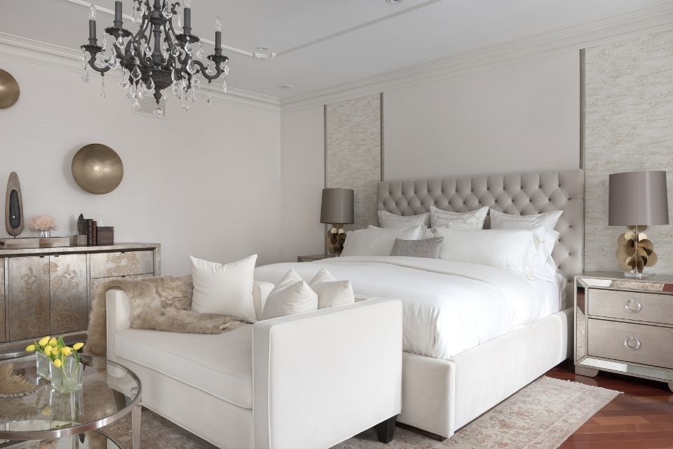 White bedroom designed by Diana Rose with chandelier 