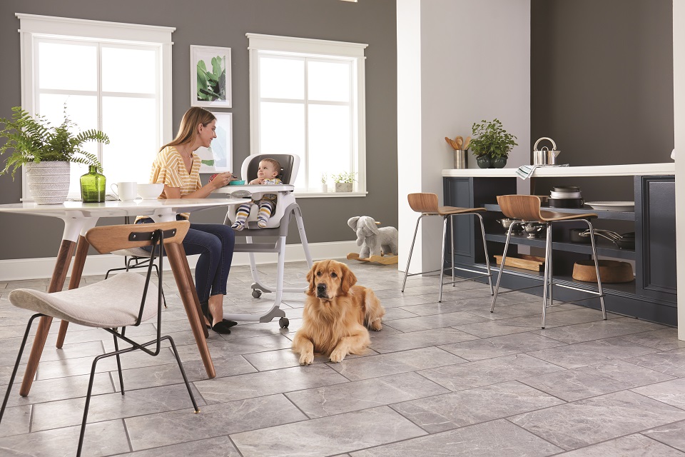 Family and dog on gray tile in living space 