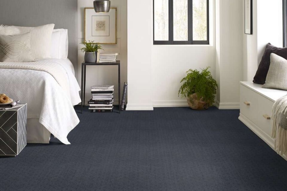 Navy blue carpet in bedroom with subtle pattern for 2022