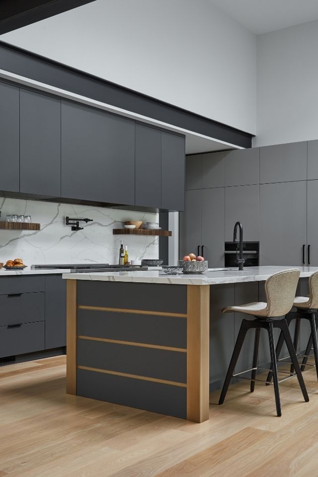 Dark gray modern kitchen with island designed by Kate Davidson 