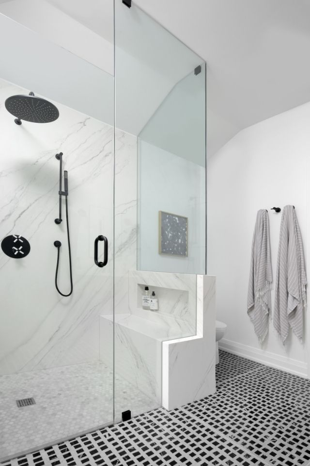 Black and white walk in shower in stylish bathroom design 