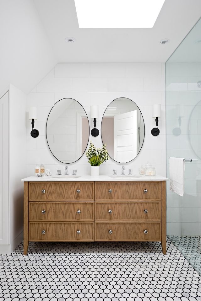 Third floor design bathroom with white and black tiles by Rebecca Hay