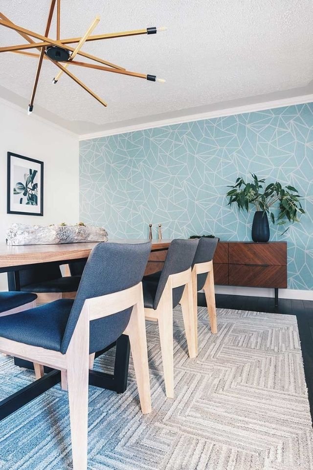 Blue wallpaper in modern dining room designed by Louis Duncan-He