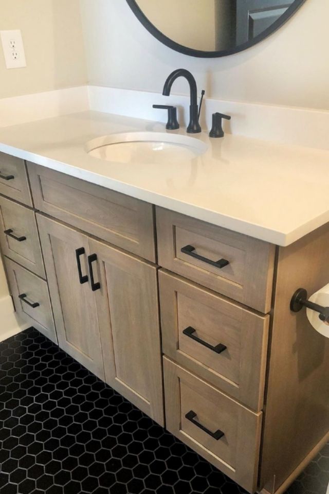 Powder room vanity update with black tile 